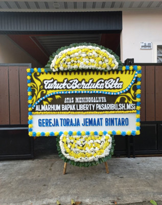 Papan Bunga Duka di Rimbo Tengah